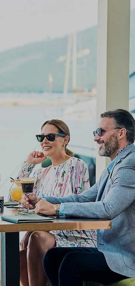 Group-of-friends-enjoying-a-fancy-meal-by-the-marina-in-Portonovi-Montenegro